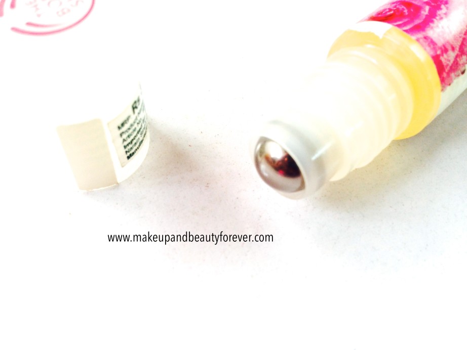The Body Shop Natural Lip Roll On Rose metal roll on applicator