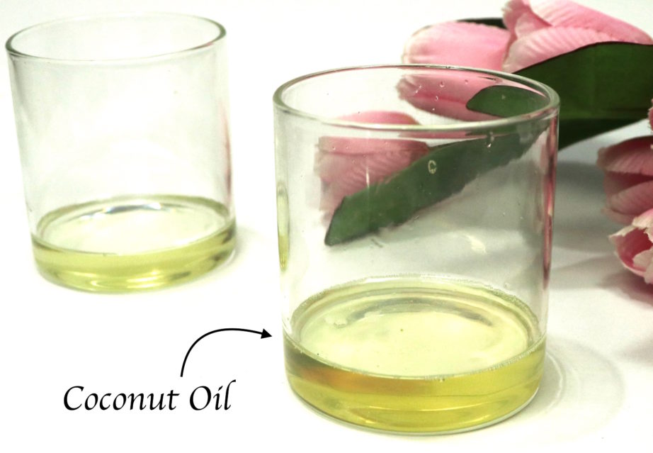 DIY Castor and Coconut Oil Deep Conditioning Mask For Hair Growth Coconut Oil in a glass container